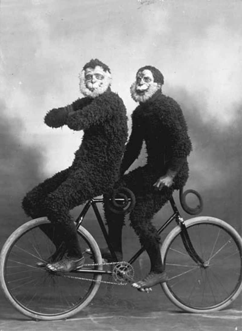 Robert Murie and Ernest Godward, both members of the Invercargill Cycling Club, pose for a photograph dressed in monkey costumes, around 1910